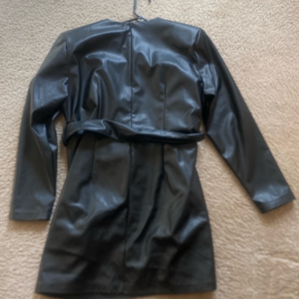Ladies size XL worn once pleather mini dress.